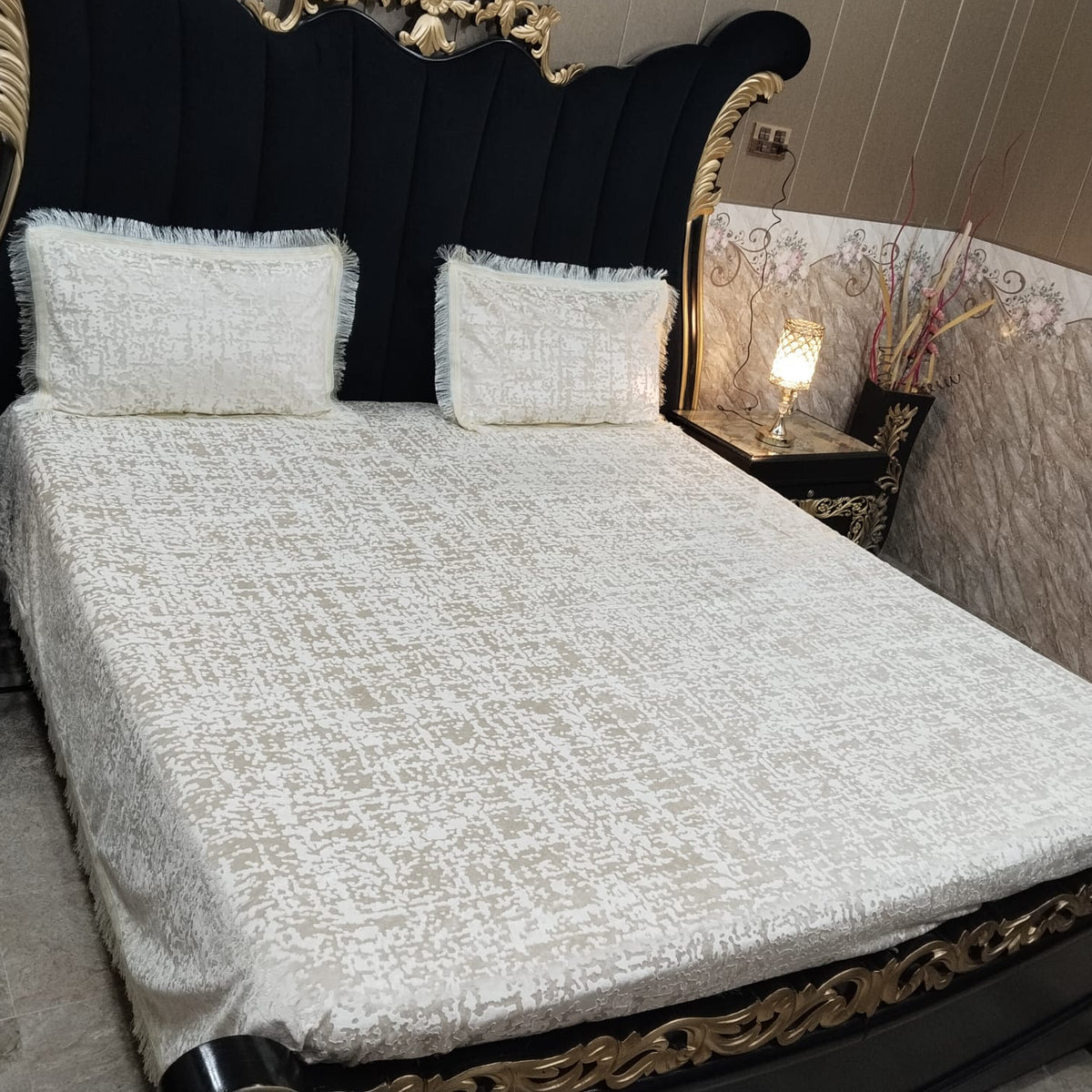 Velvet bedsheet from Barfi collection by Al Ghani O Nisar, featuring soft fabric with intricate patterns and rich red color.