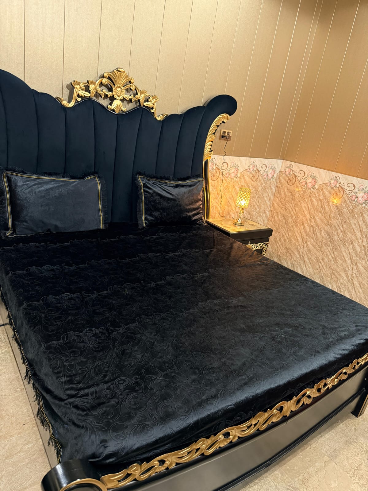 Al Ghani O Nisar embossed velvet bedsheet with intricate patterns, showcasing luxurious texture and rich fabric detail.