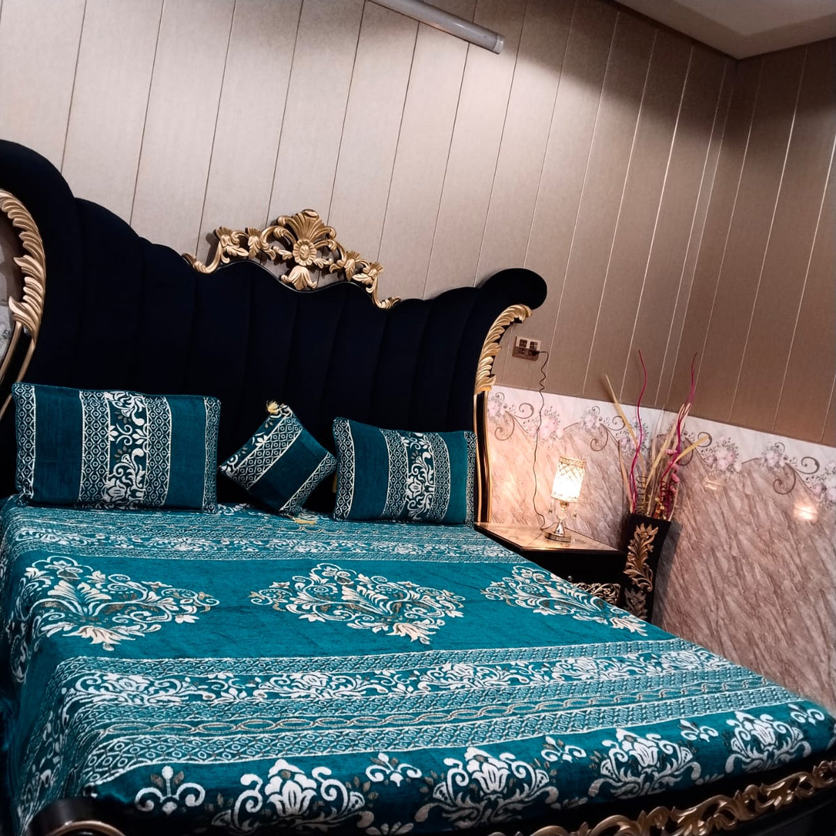 Al Ghani O Nisar Jovial Jacquard bedsheet with intricate woven pattern in vibrant colors, displayed on a neatly made bed.