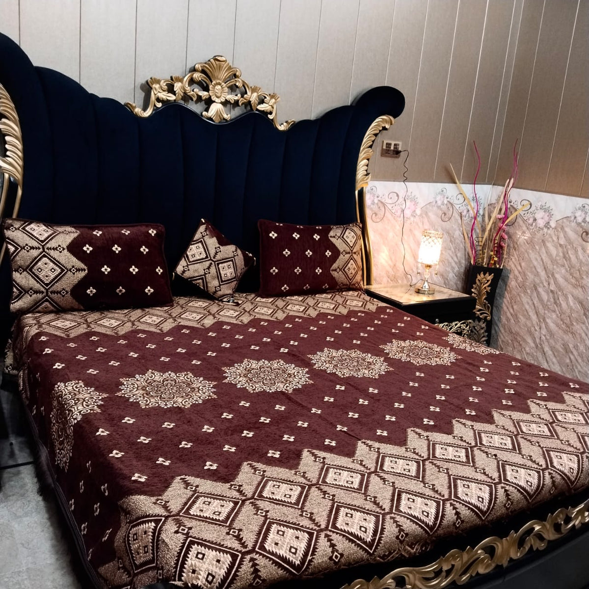 Al Ghani O Nisar Jovial Jacquard bedsheet with intricate floral pattern in vibrant colors, neatly spread on a bed.