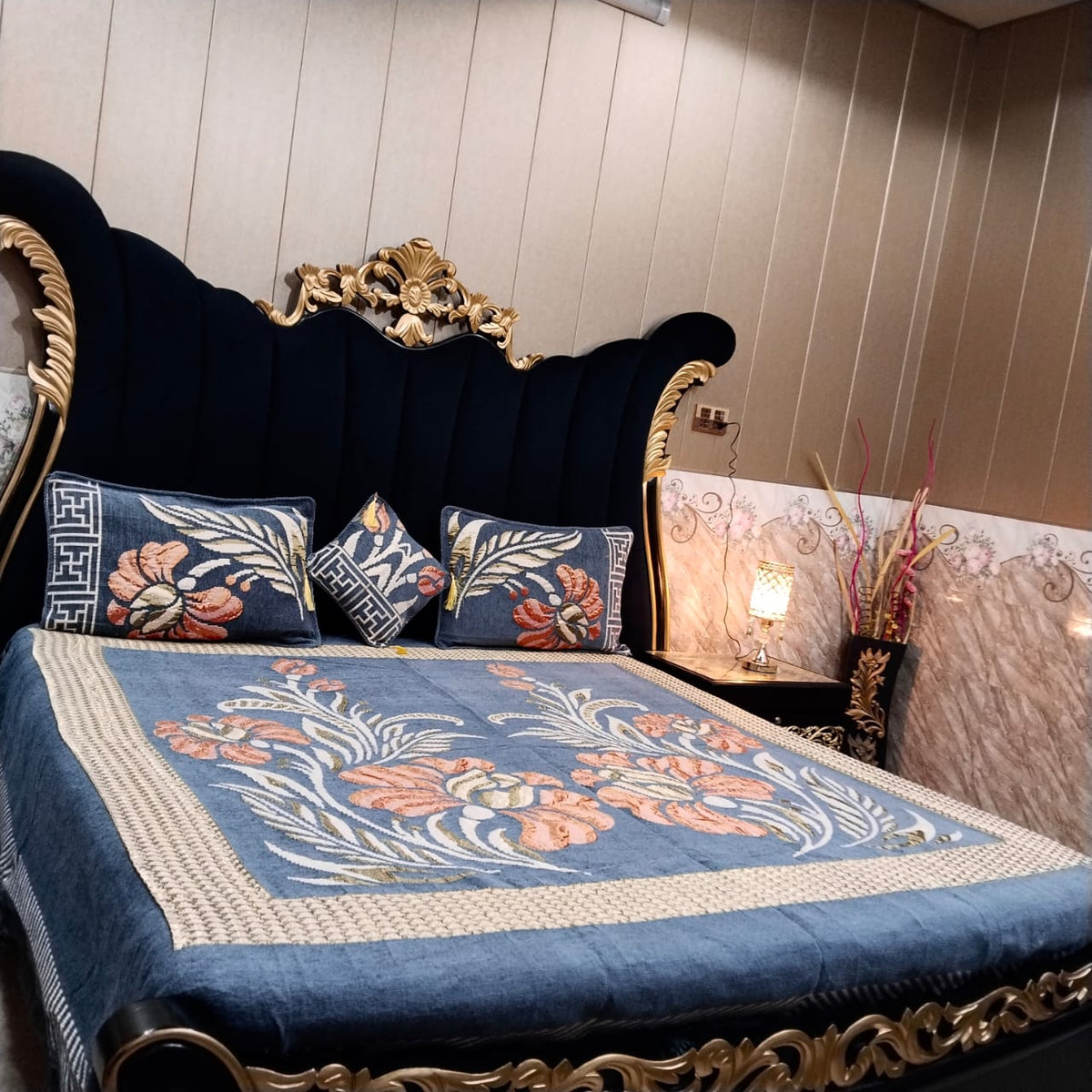 Al Ghani O Nisar Jovial Jacquard bedsheet with intricate patterns and vibrant colors, displayed on a neatly made bed.