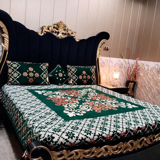 Al Ghani O Nisar Jovial Jacquard bedsheet with intricate patterns and vibrant colors, displayed on a neatly made bed.