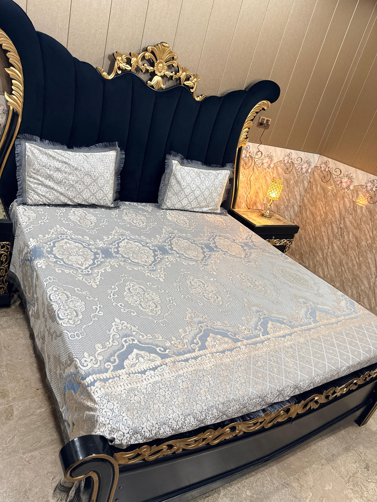 Al Ghani O Nisar Palachi bedsheet with intricate floral pattern, soft fabric, and vibrant colors suitable for bedroom decor.