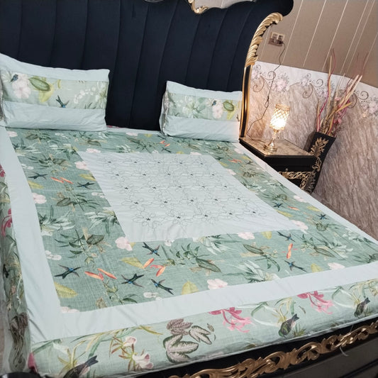 Colorful embroidered patchwork bedsheet by Al Ghani O Nisar featuring vibrant patterns and intricate stitching.