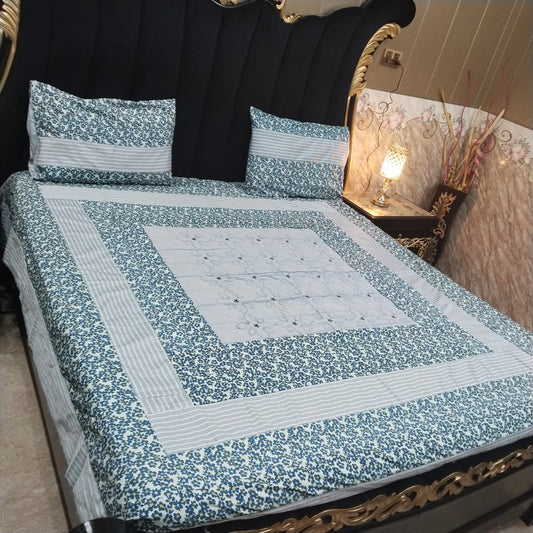 Colorful embroidered patchwork bedsheet by Al Ghani O Nisar featuring intricate patterns and vibrant design for a cozy bedroom look.