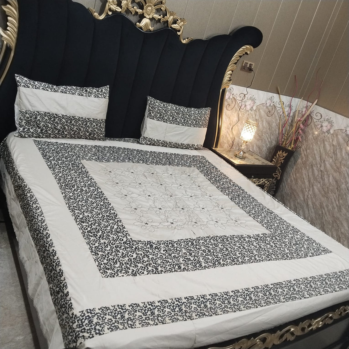 Embroidered patchwork bedsheet by Al Ghani O Nisar featuring colorful, intricate designs on soft fabric, perfect for bedroom decor.
