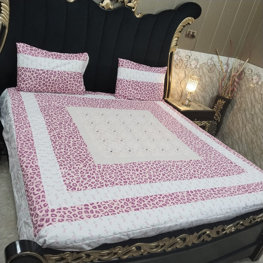 Colorful embroidered patchwork bedsheet by Al Ghani O Nisar featuring intricate, vibrant fabric patterns and detailed stitching.