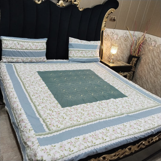 Colorful embroidered patchwork bedsheet from Al Ghani O Nisar featuring intricate patterns and vibrant fabric.