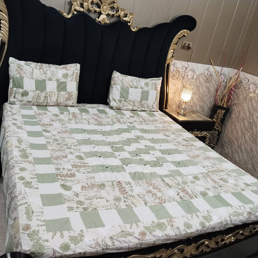 Colorful embroidered patchwork bedsheet by Al Ghani O Nisar featuring intricate designs and vibrant fabric for a cozy bedroom decor