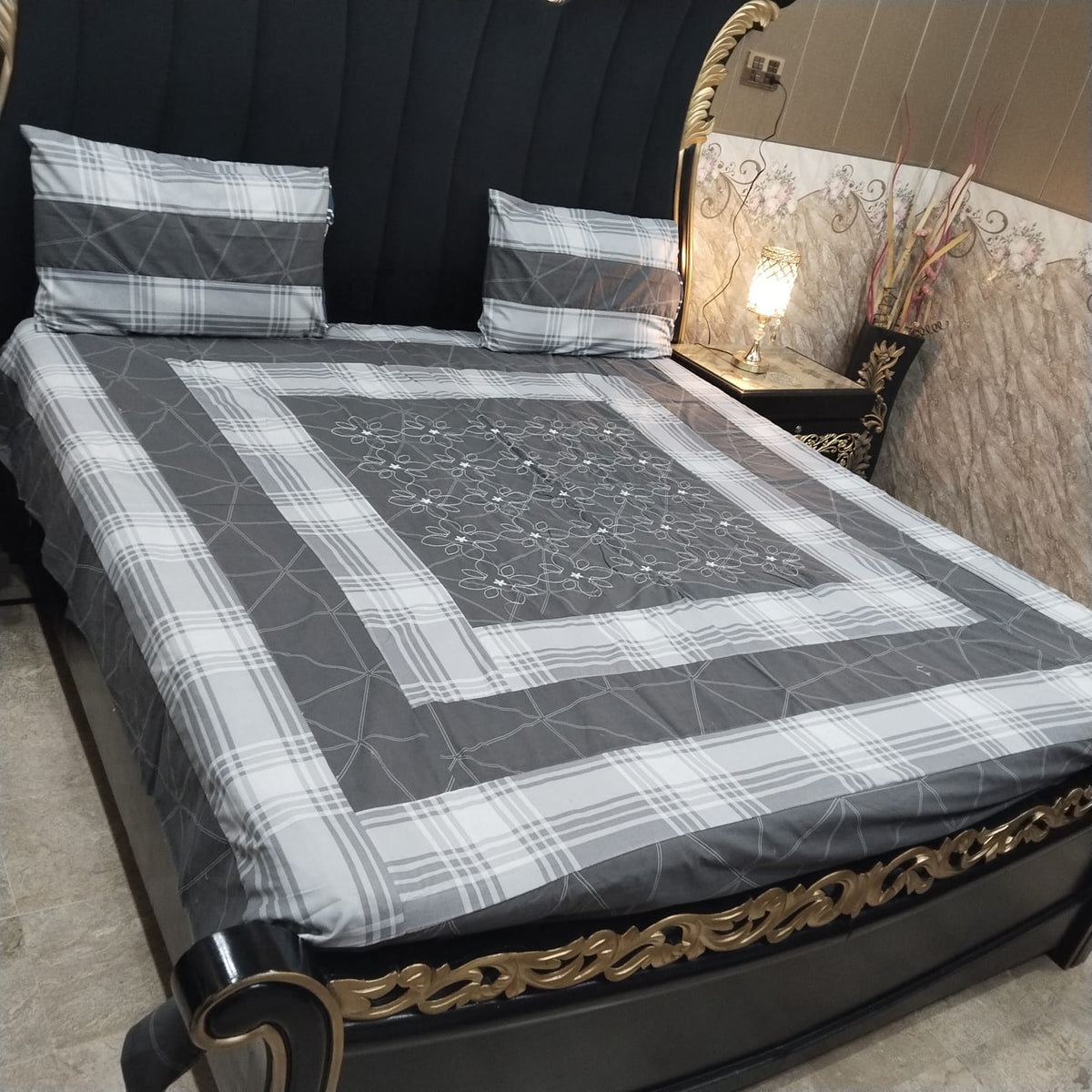 Colorful embroidered patchwork bedsheet by Al Ghani O Nisar with intricate patterns and vibrant design, perfect for stylish bedroom decor.