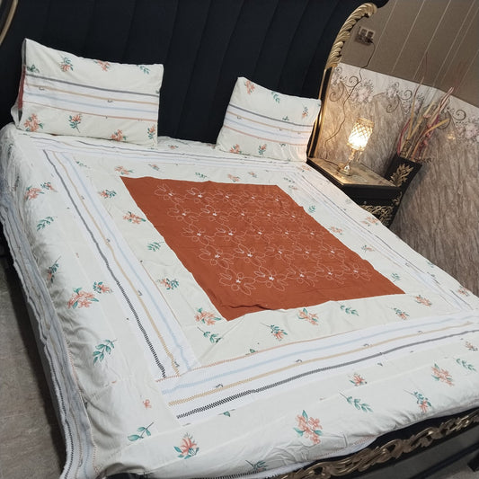 Colorful embroidered patchwork bedsheet by Al Ghani O Nisar featuring intricate patterns and vibrant fabric details.