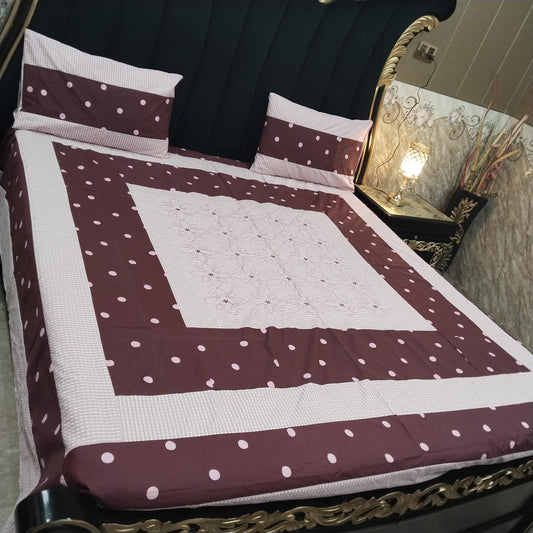 Colorful embroidered patchwork bedsheet by Al Ghani O Nisar featuring intricate patterns and vibrant design.