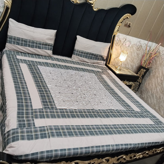 Colorful embroidered patchwork bedsheet by Al Ghani O Nisar, showcasing intricate design and vibrant fabric details.
