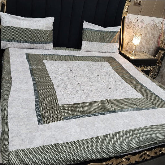 Colorful embroidered patchwork bedsheet by Al Ghani O Nisar with intricate designs and vibrant patterns.